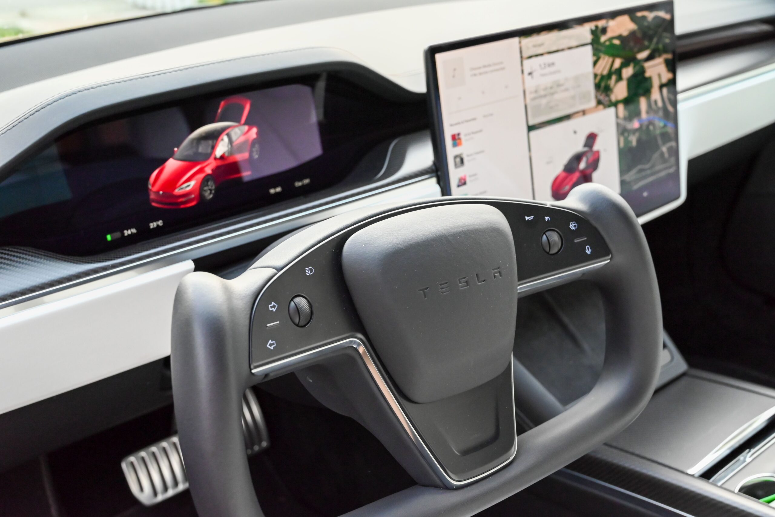 Tesla infotainment screen showing a software update in progress